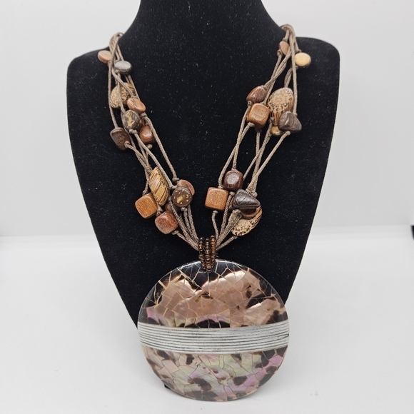 Jewelry - brown cord necklace with wooden beads and large coconut shell inlay pendant